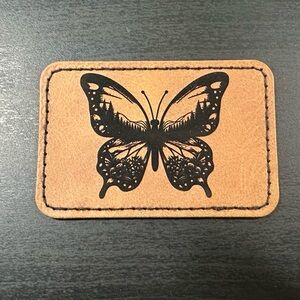 Tan Leatherette Patch with Black Butterfly Design